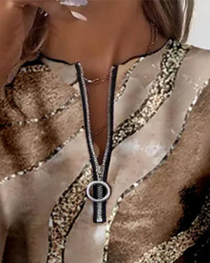 Lera - Sweatshirt med halv dragkedja och vintage tryck